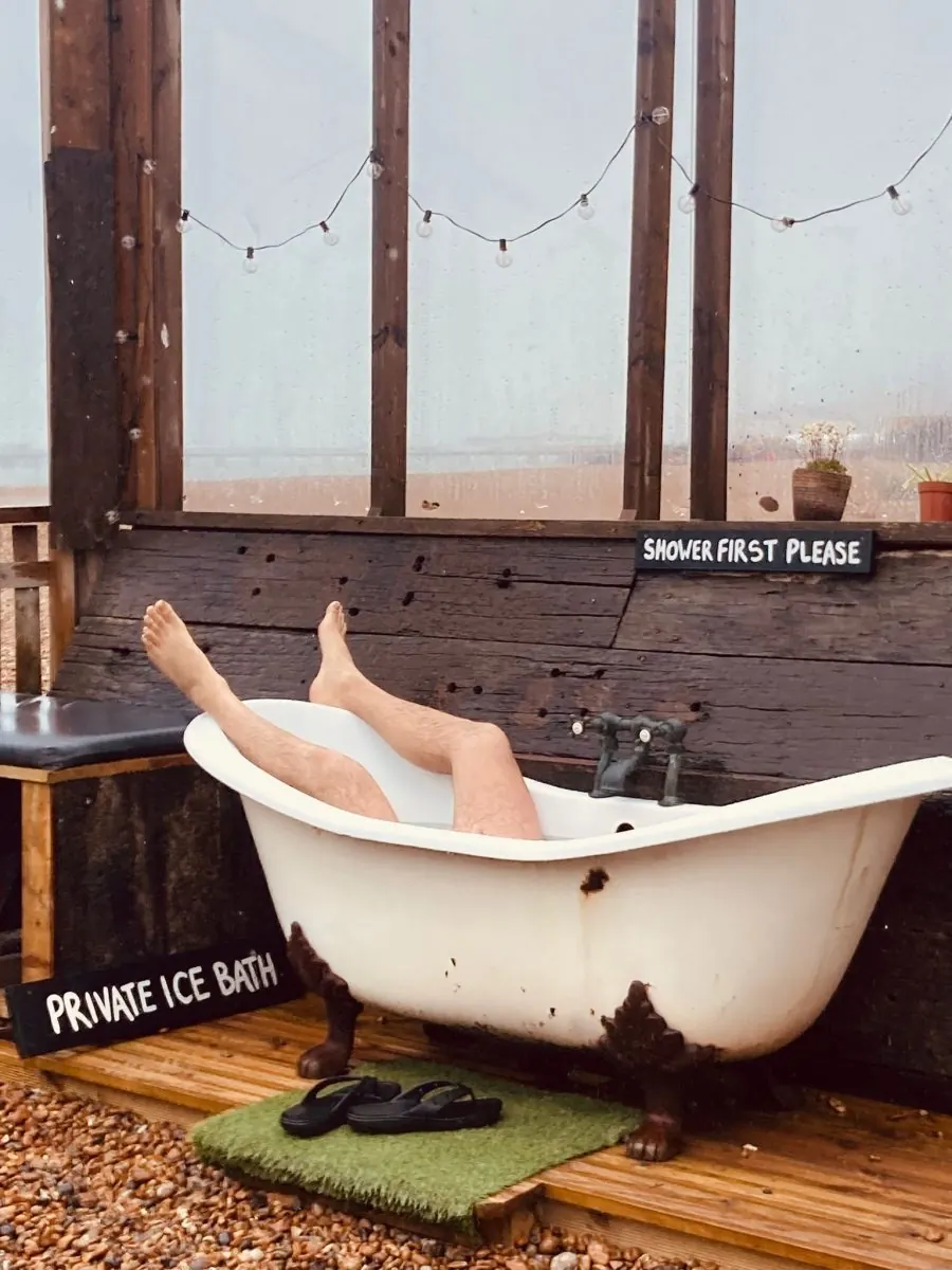 Private ice bath in a roll-top tub on the beach