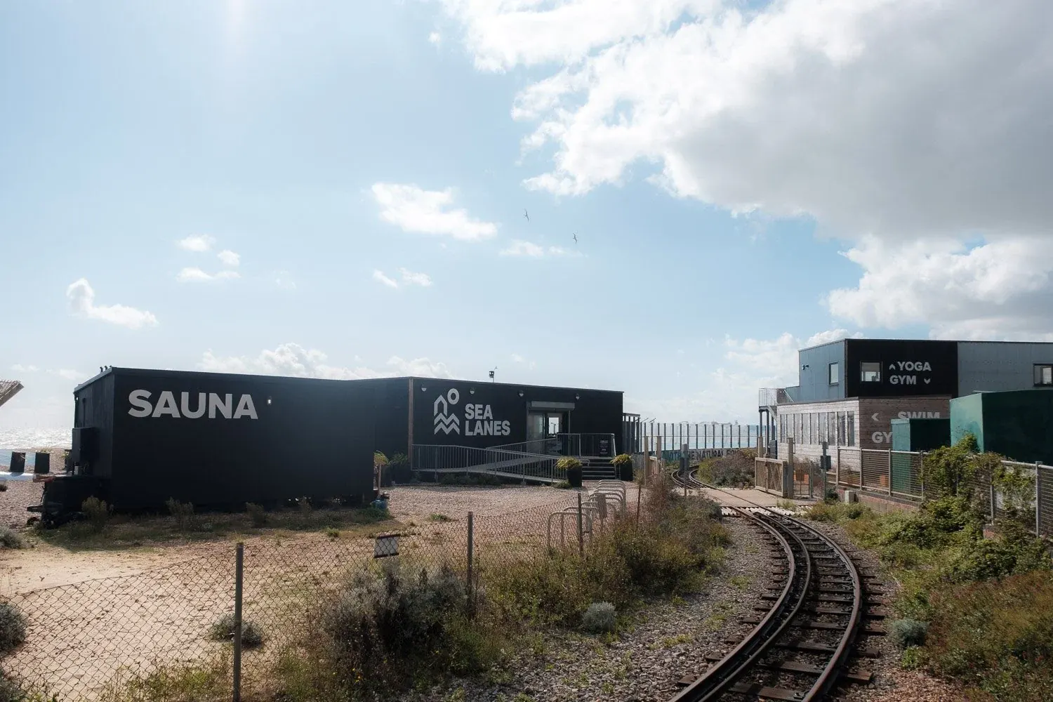 The black Luna Hut sauna beside the Volk's Railway at Sea Lanes
