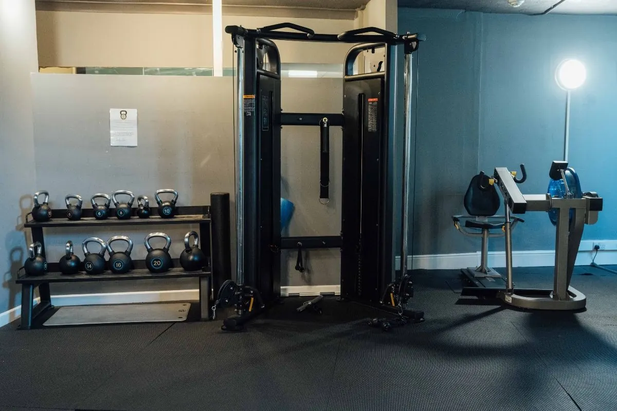 Leisure club gym with kettlebells and cable machine