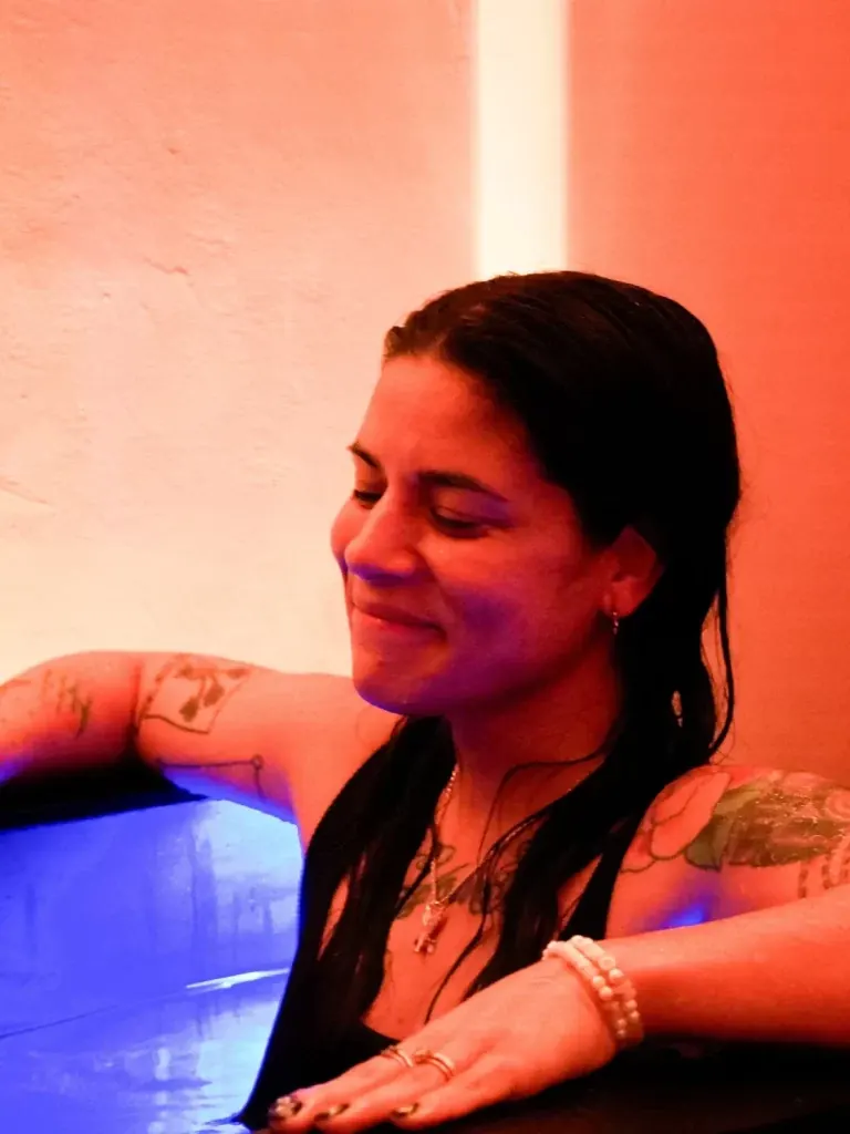 Woman relaxing in the cold plunge