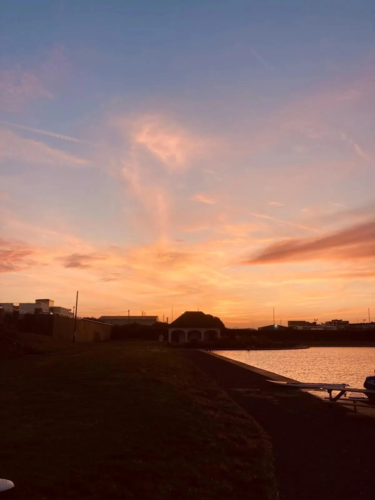 Sunset over the lake and park